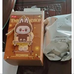 Labubu POP LAND TIMBER WORKSHOP PLAYING ON THE SWING PLUSH PENDANT Series SECRET Dark Brown -Toysez 7 3 6f197c5f 8ea0 444d 81cb 046cdcb99f27